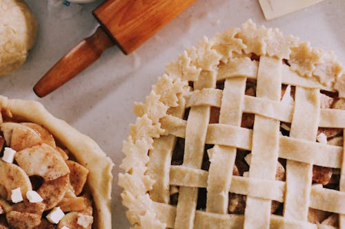 Free Two Assorted Pies On Table Stock Photo