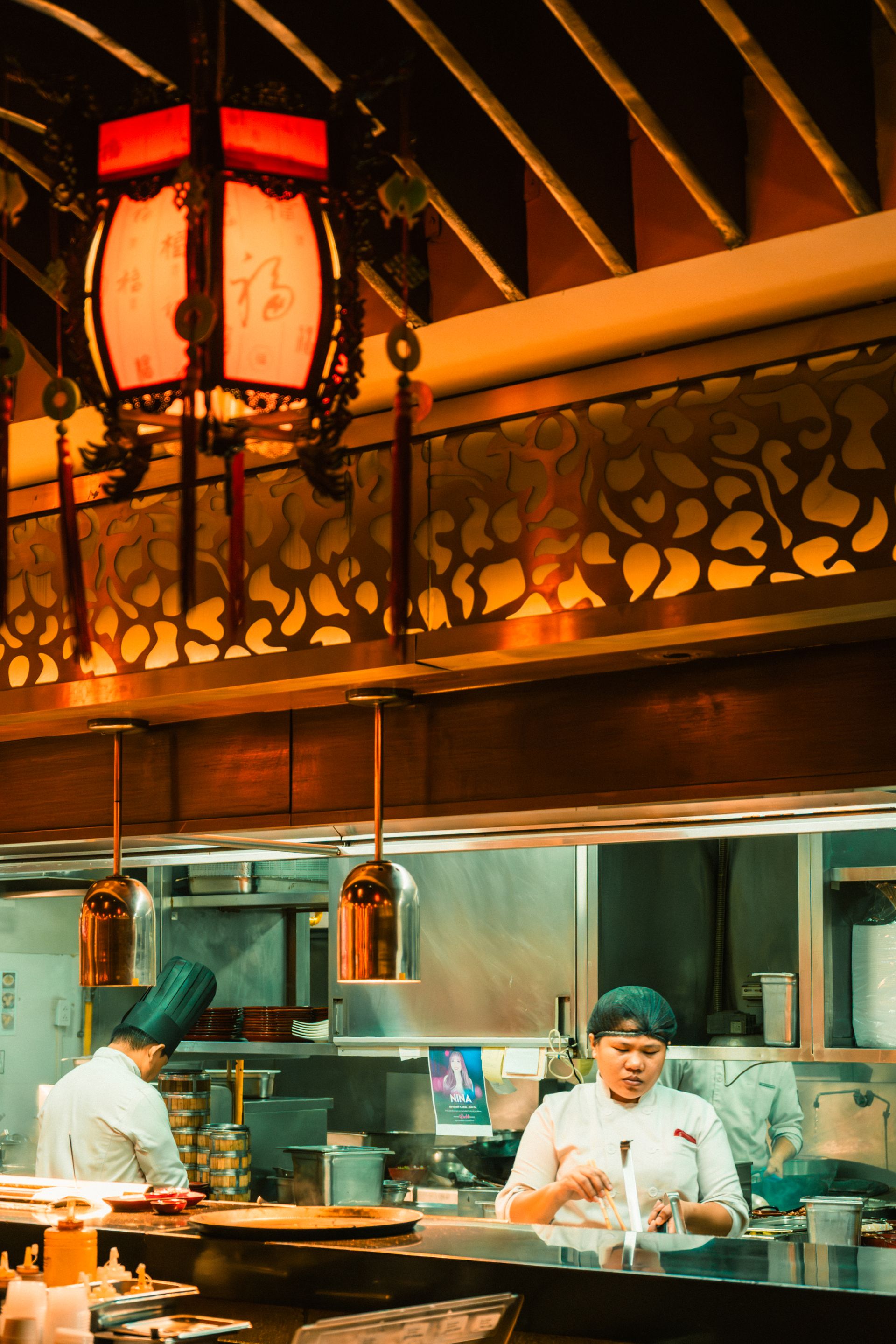 Chefs preparing dishes in the Aozoro kitchen