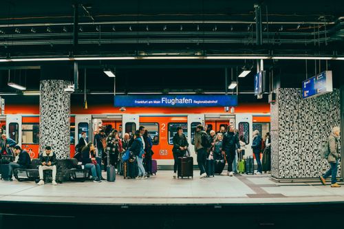 Travelers using public transportation in Europe