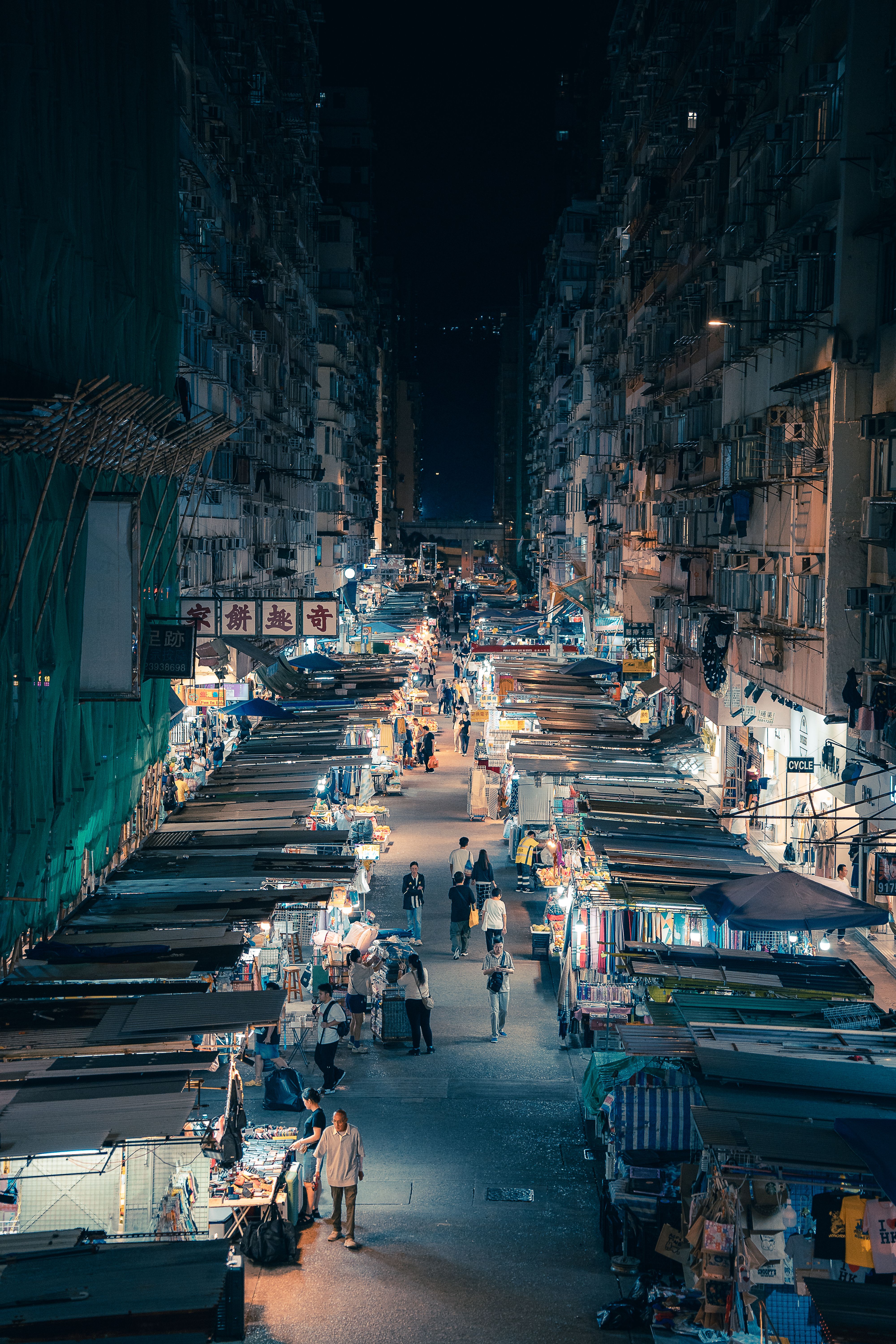 Vibrant Night Market Scene in Hong Kong · Free Stock Photo