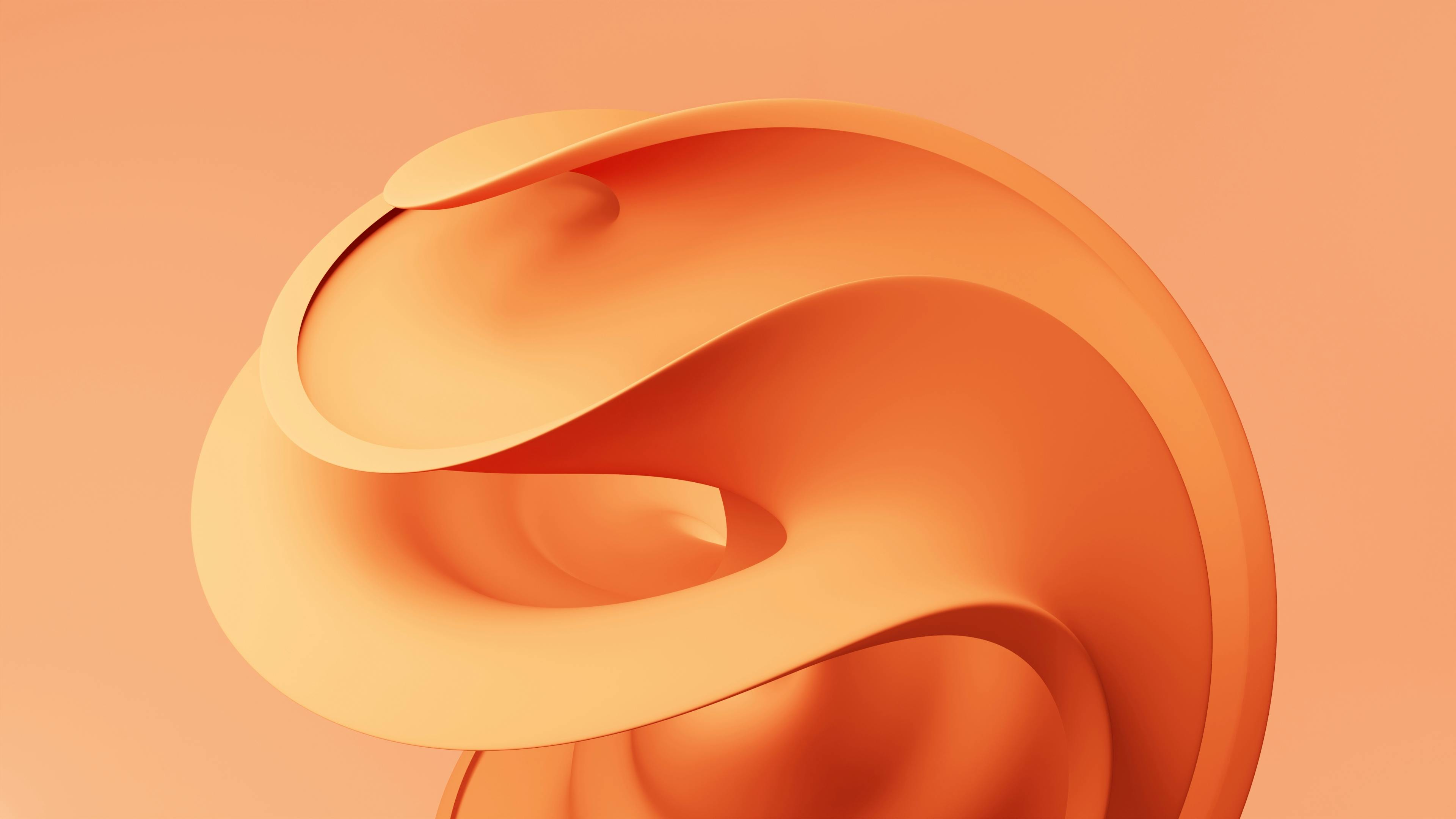 Free A vibrant abstract orange form with flowing curves on a soft gradient background. Stock Photo
