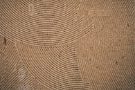 Intricate Coir Mat Texture with Curved Patterns
