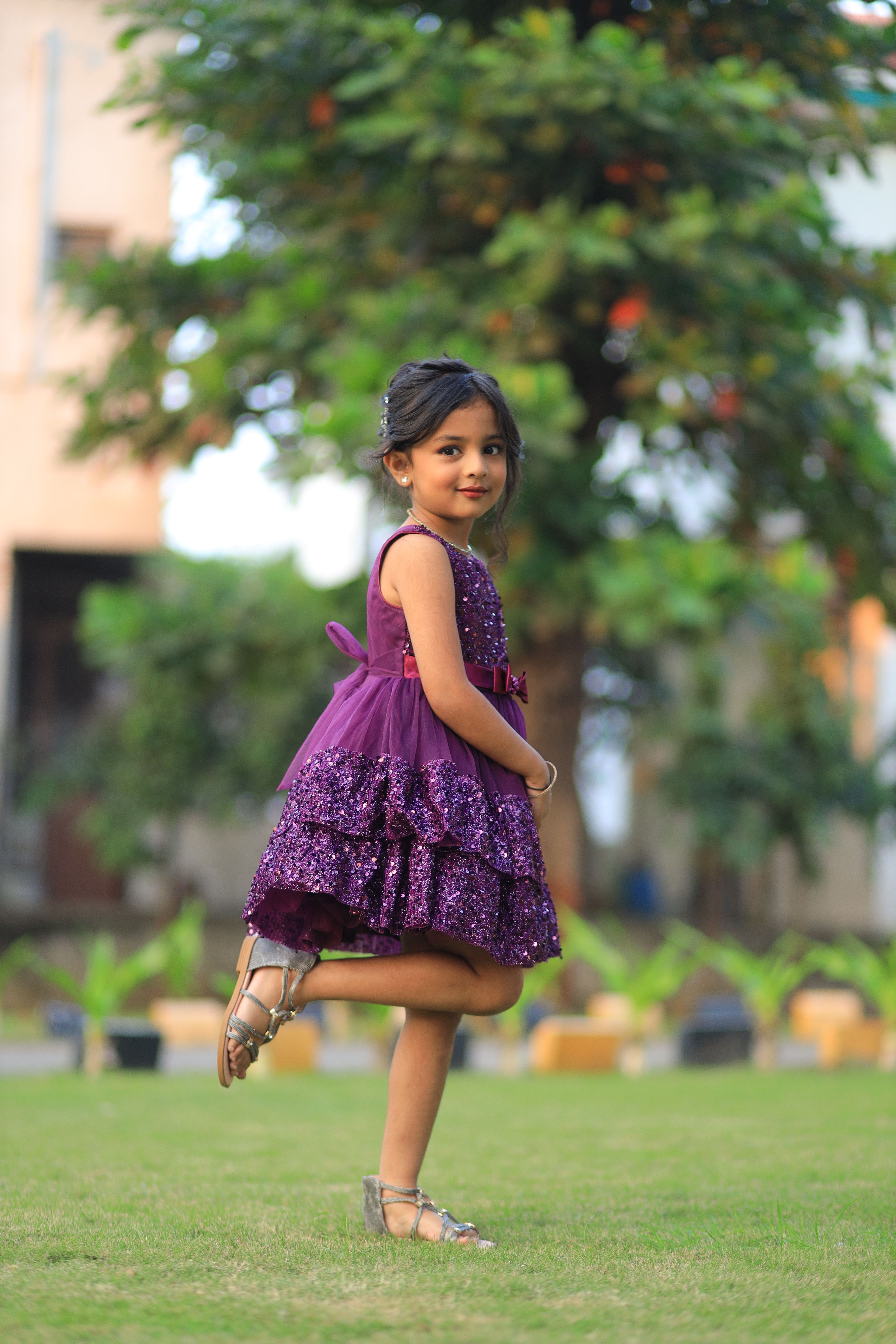 Adorable Young Girl in Purple Dress Outdoors · Free Stock Photo