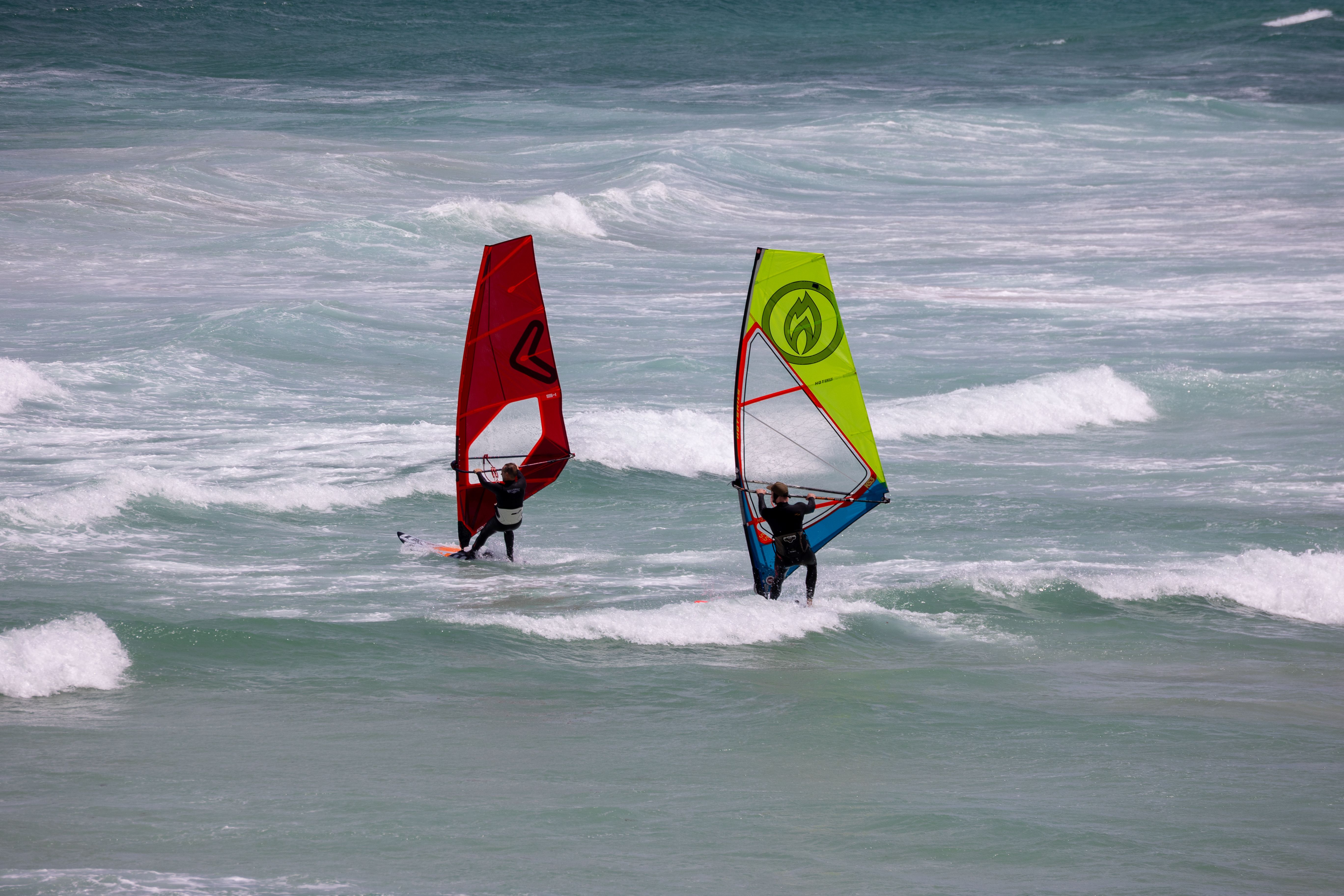 Windsurf or watch the surf at Curium beach