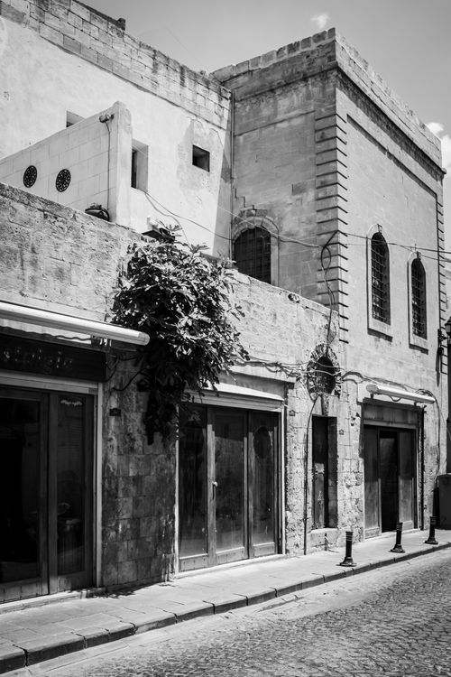 Free Black and white photo of vintage, historic buildings in a classic street scene. Stock Photo