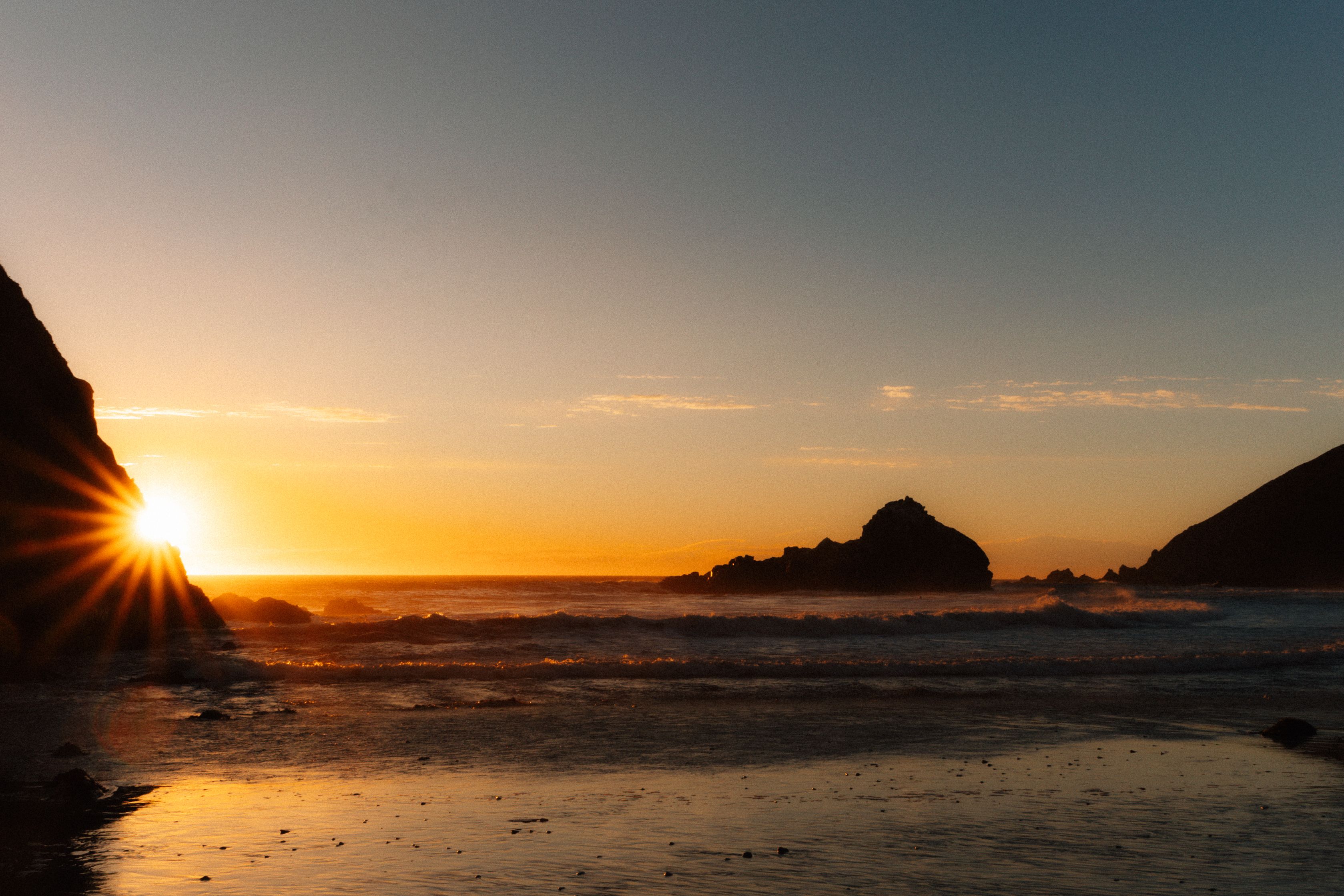 Sunset Over Rocky Beach With Ocean Waves · Free Stock Photo