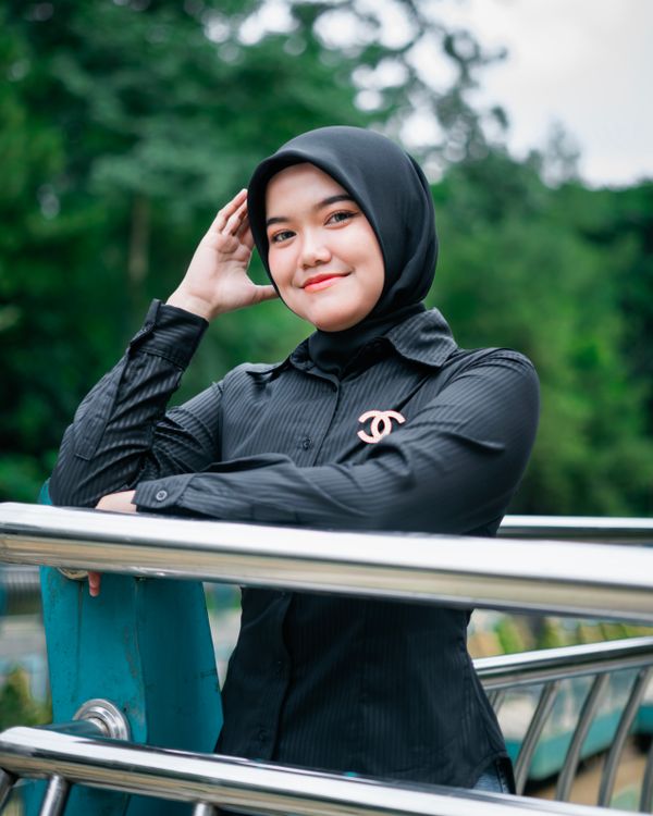 Smiling Muslim Woman in Hijab Outdoors in Indonesia · Free Stock Photo