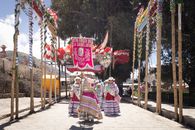 Colorful cultural celebration showcasing traditional Peruvian dance and attire in Caylloma, Arequipa.