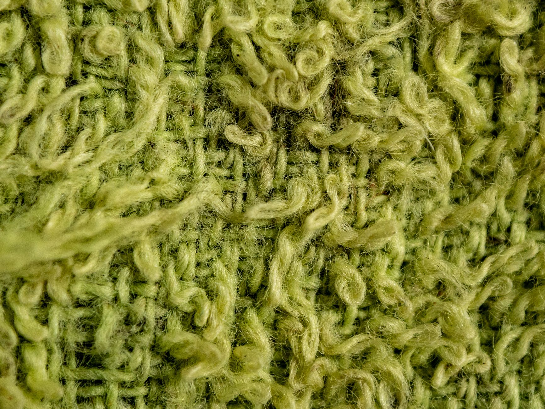 magnified comparison of dense loop structure versus loose loop structure in double-knit ponte fabric showing visible density differences