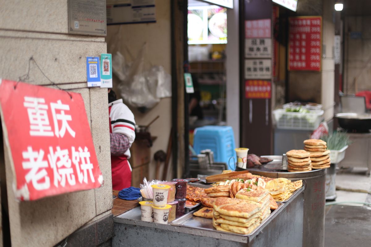 Street food image for temple fair snacks, regional markets, and festival food pages. Public-source visual preview.