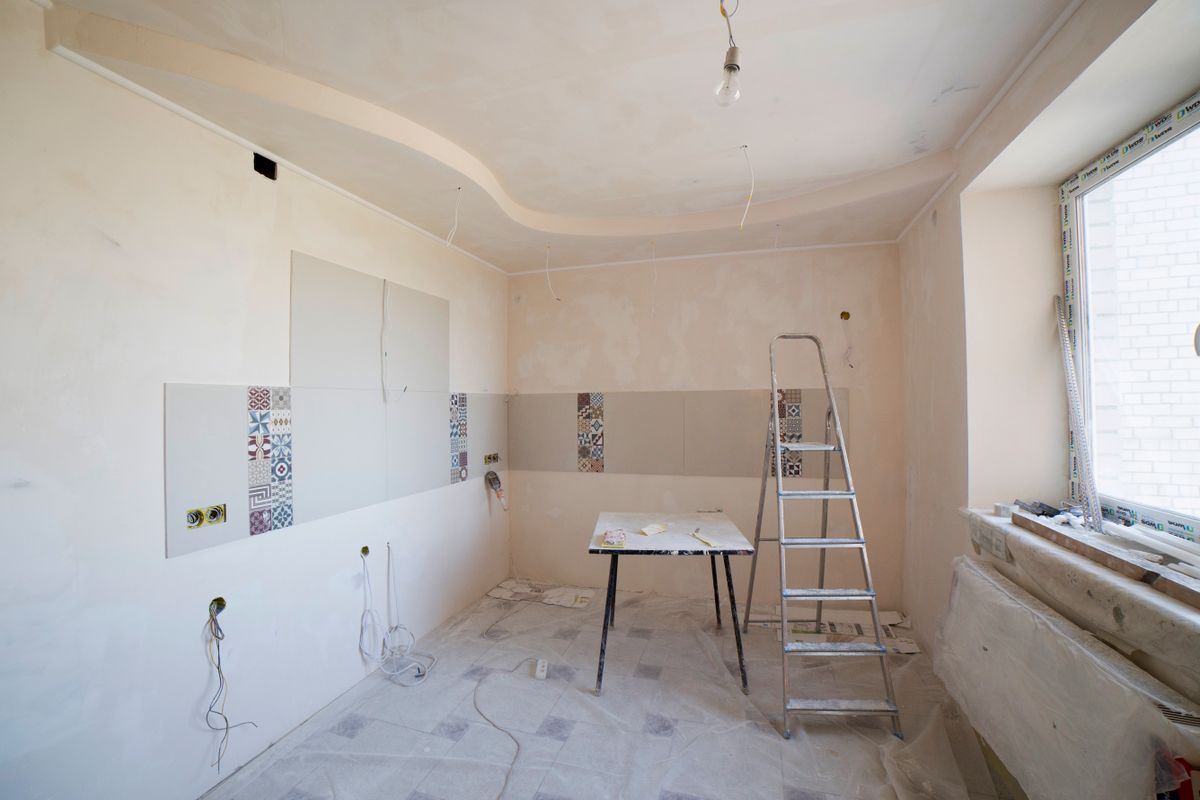 Premium modular kitchen with dining island after design renovation by Beyond Briks
