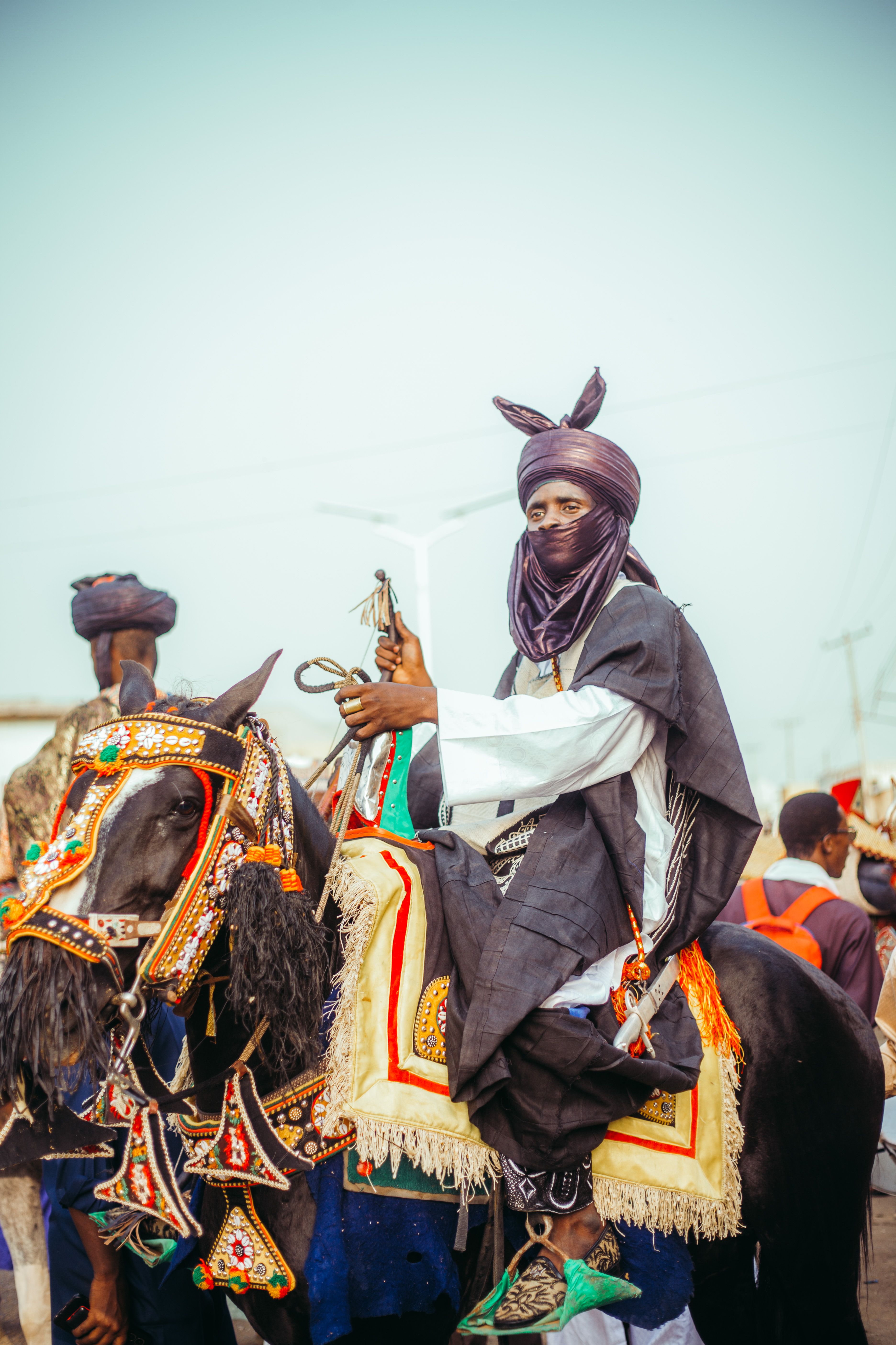 African Horse Rider in Traditional Attire · Free Stock Photo