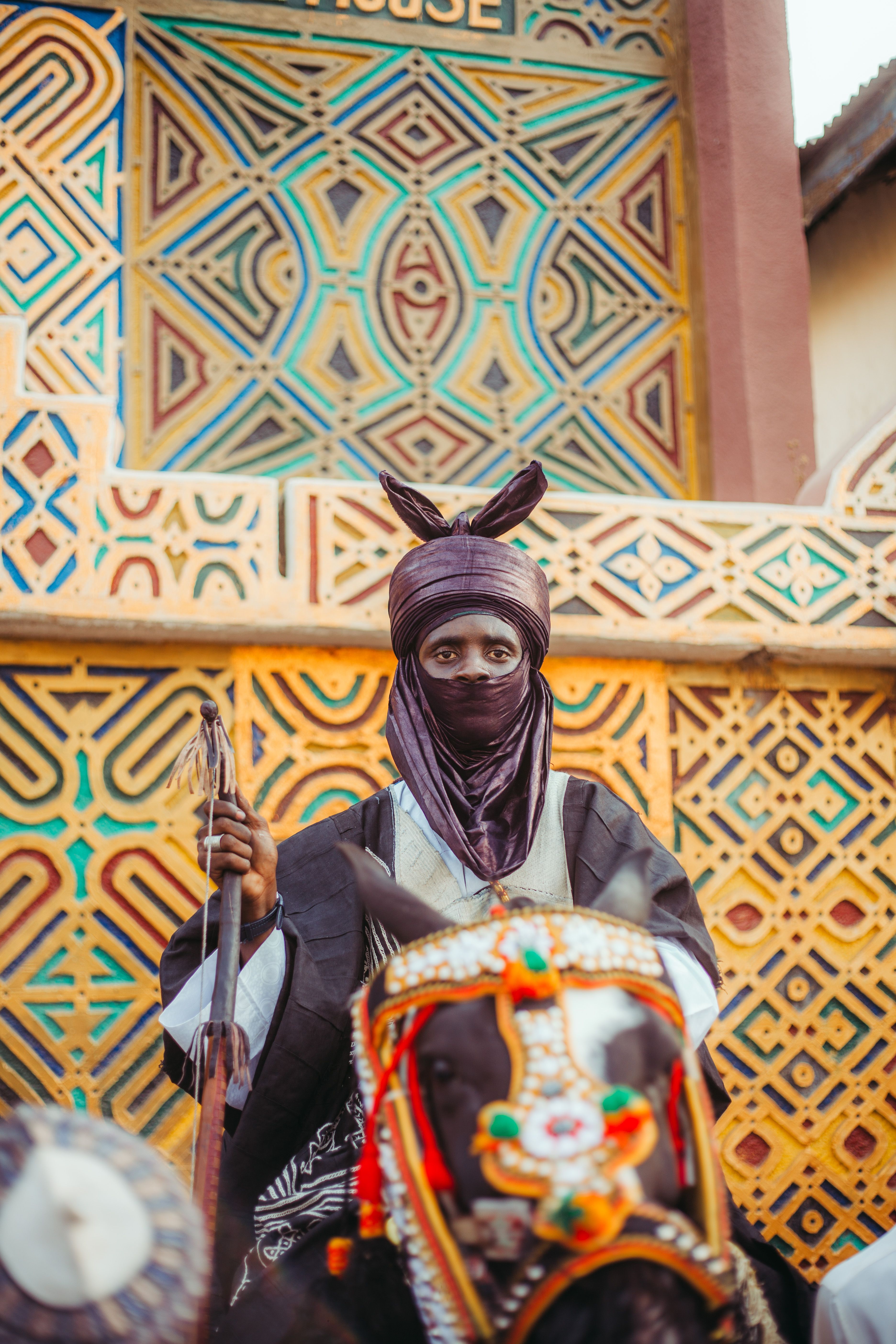 Traditional Nigerian Rider in Colorful Attire · Free Stock Photo