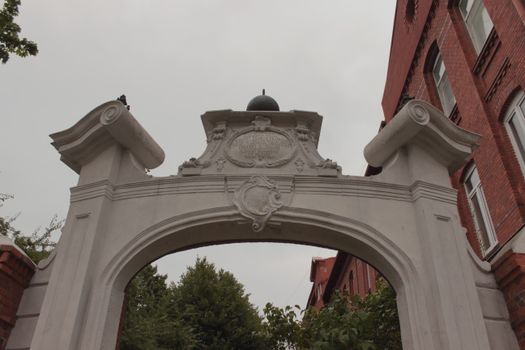 A beautiful historic archway in Kaliningrad, showcasing intricate architectural details and design.