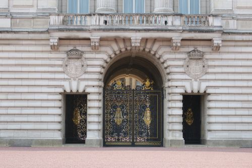 Free Ornate gates and architecture of Buckingham Palace in London. Stock Photo