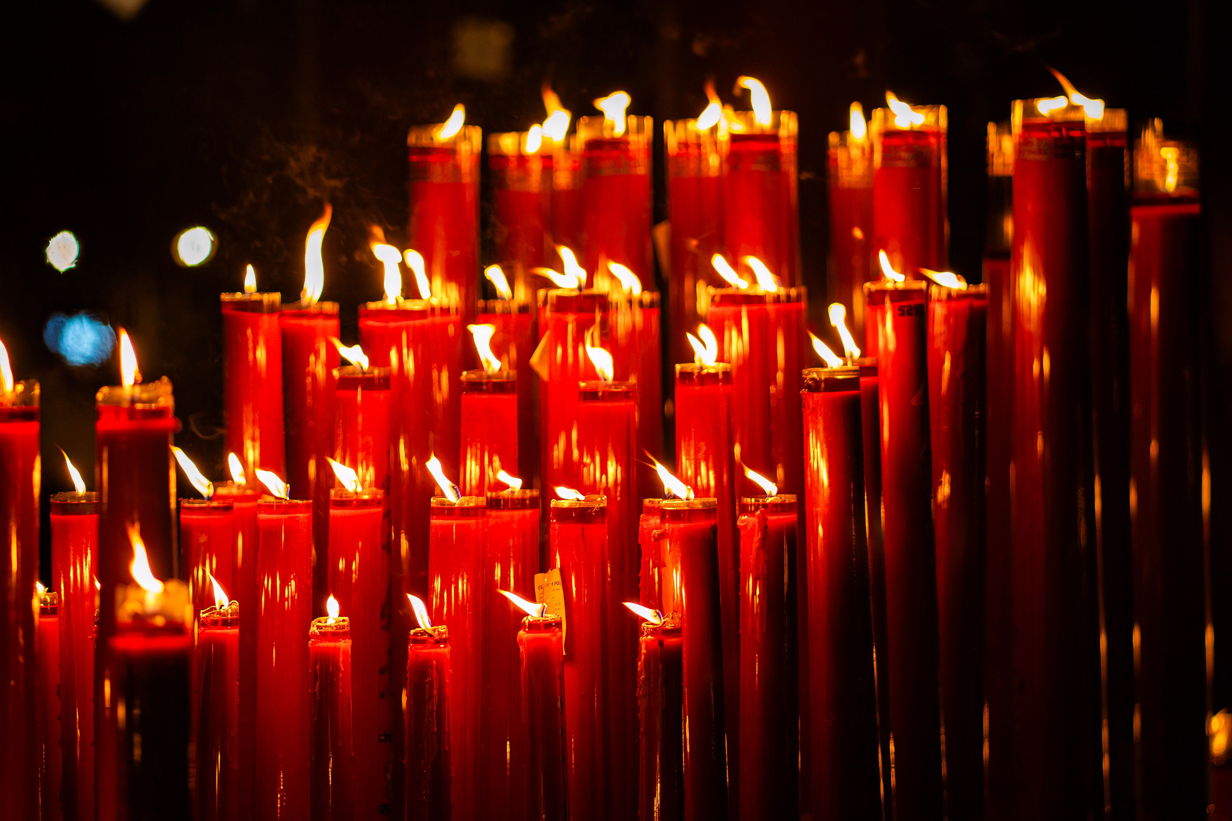 Glowing Red Candles in the Dark · Free Stock Photo