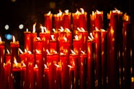 Glowing Red Candles in the Dark