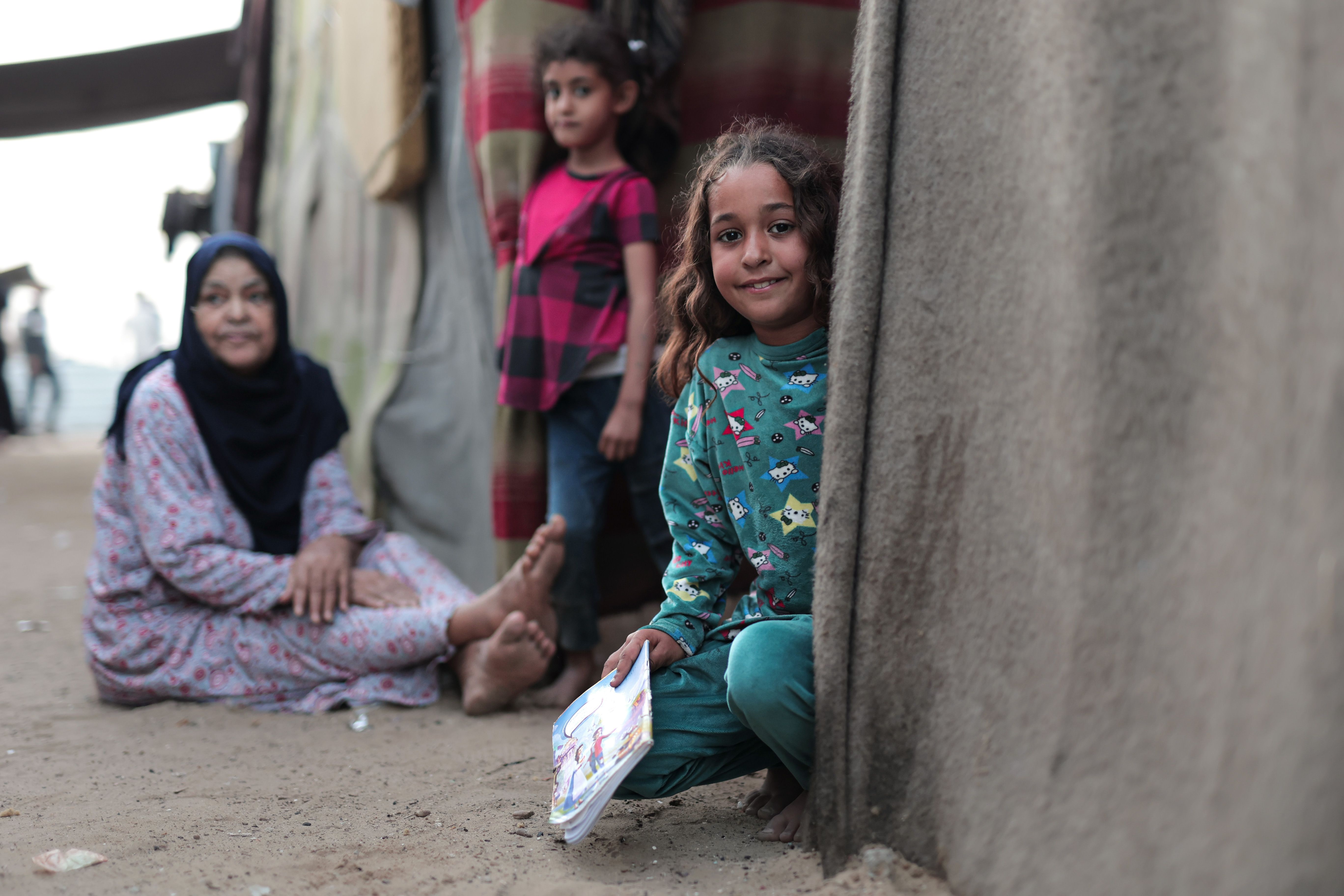 Children in Gaza Smiling Near Their Home · Free Stock Photo