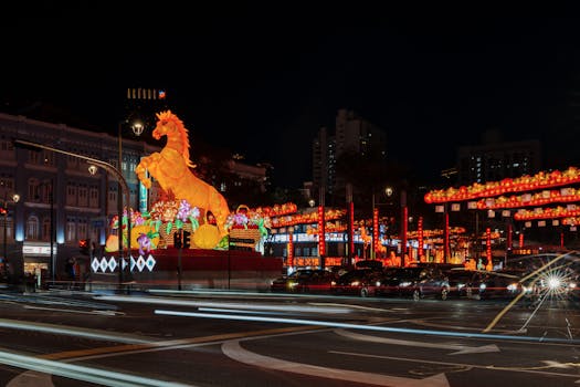 Colorful lantern festival featuring a large horse sculpture illuminating the city night.
