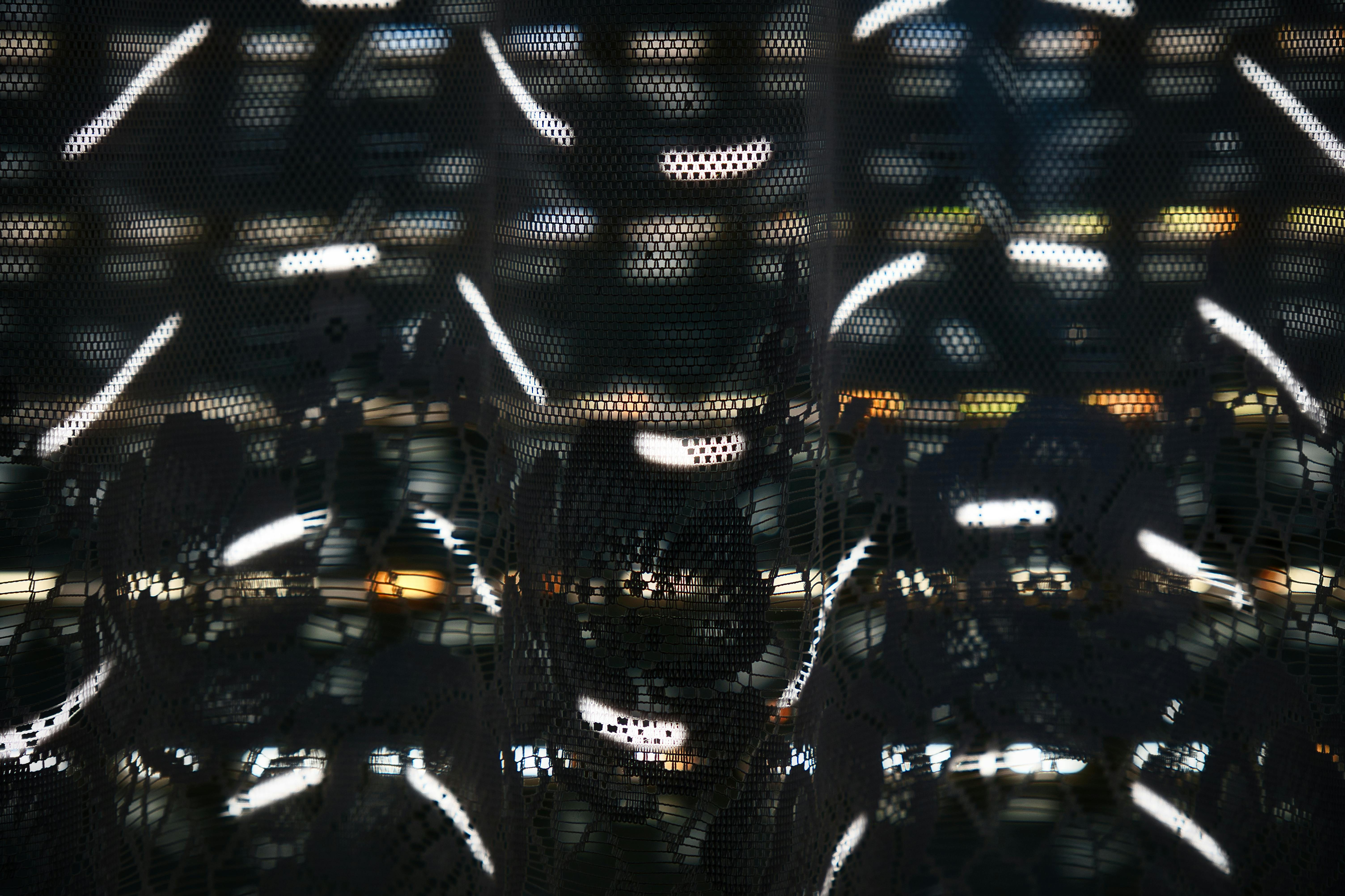 Free Abstract play of light and shadow through mesh in Pforzheim, Germany. Stock Photo