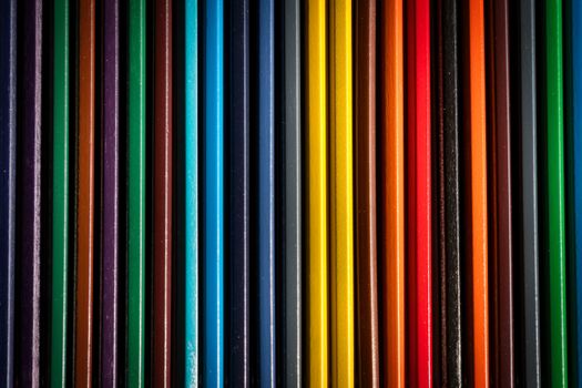 An abstract image featuring vibrant vertical stripes in various colors creating a vivid pattern.