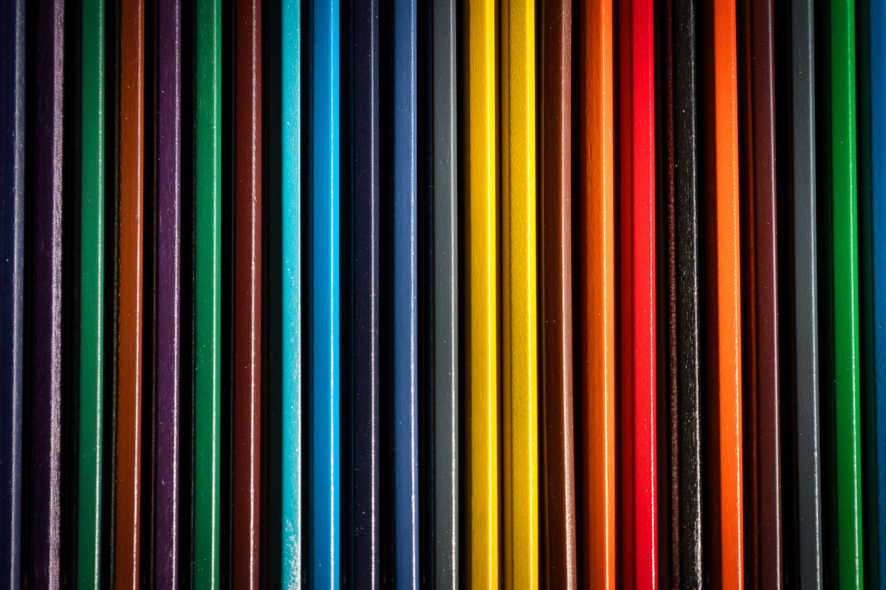 an abstract image featuring vibrant vertical stripes in various colors