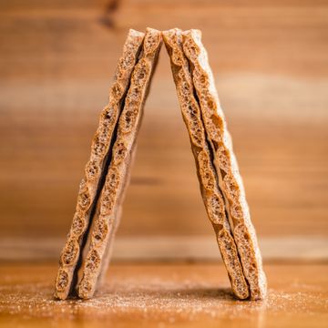 Stacked seeded crispbread slices, photo by Edita Brus on Pexels