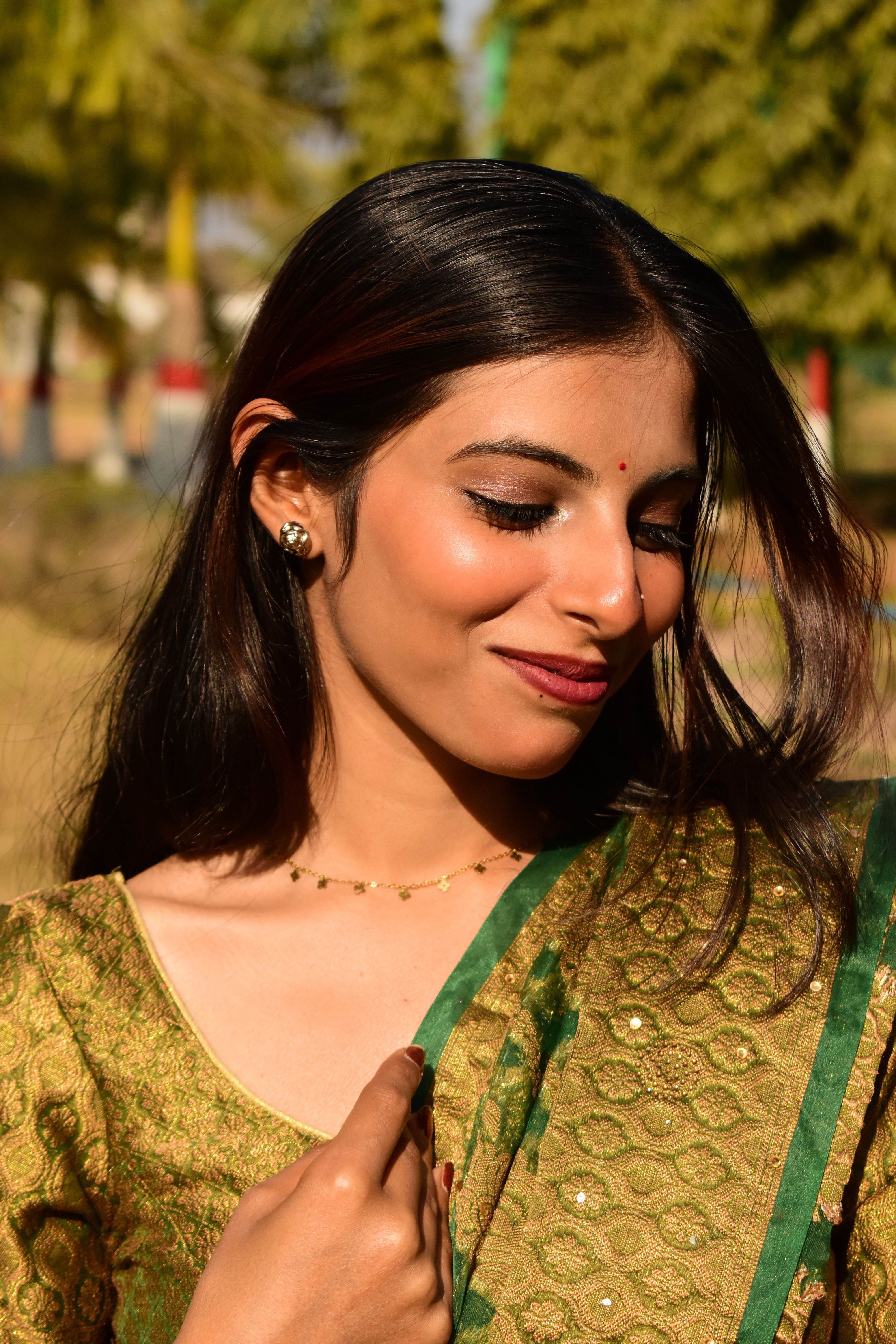 Portrait of a Young Woman in Traditional Attire · Free Stock Photo