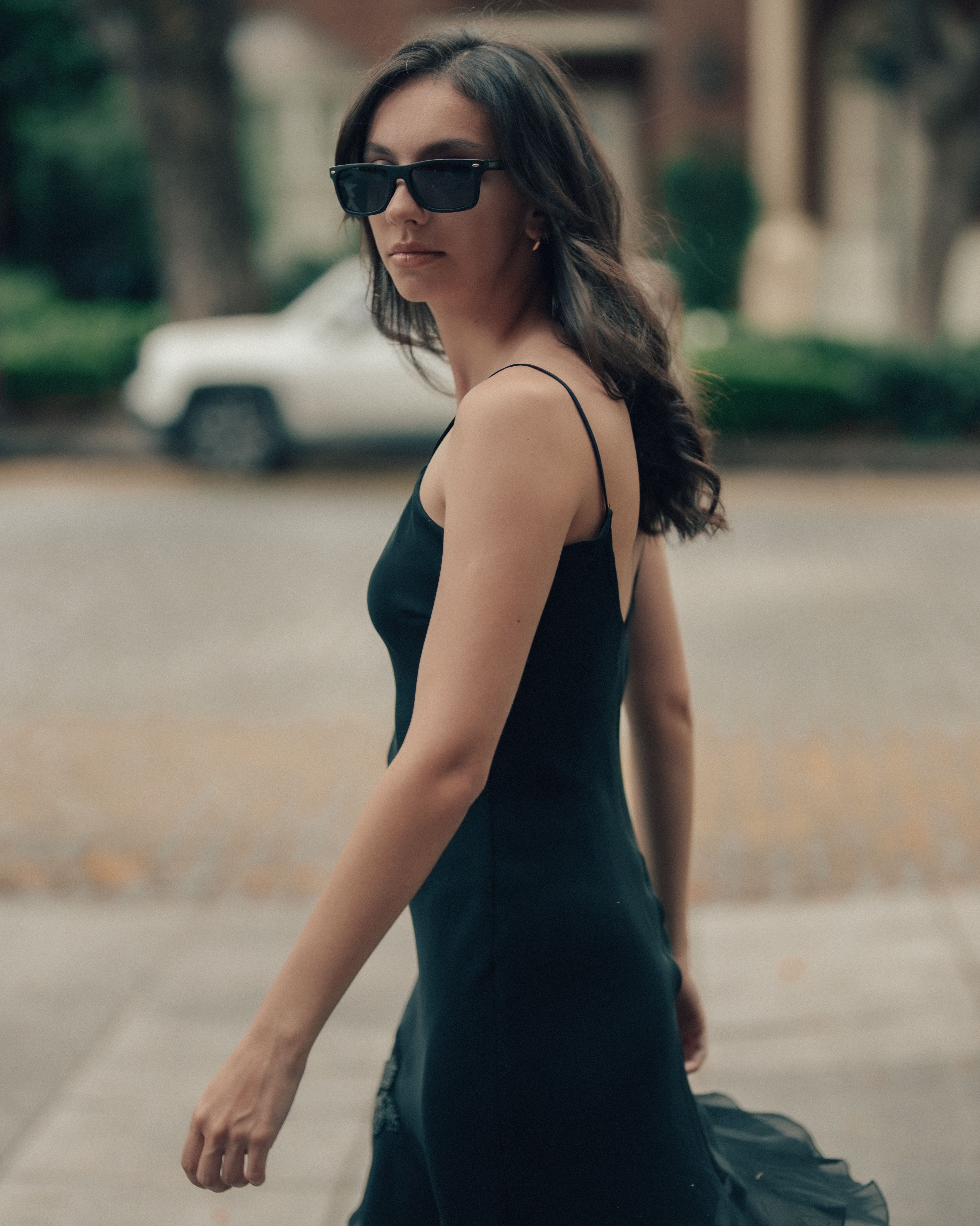 Elegant Woman in Black Dress Outdoors · Free Stock Photo