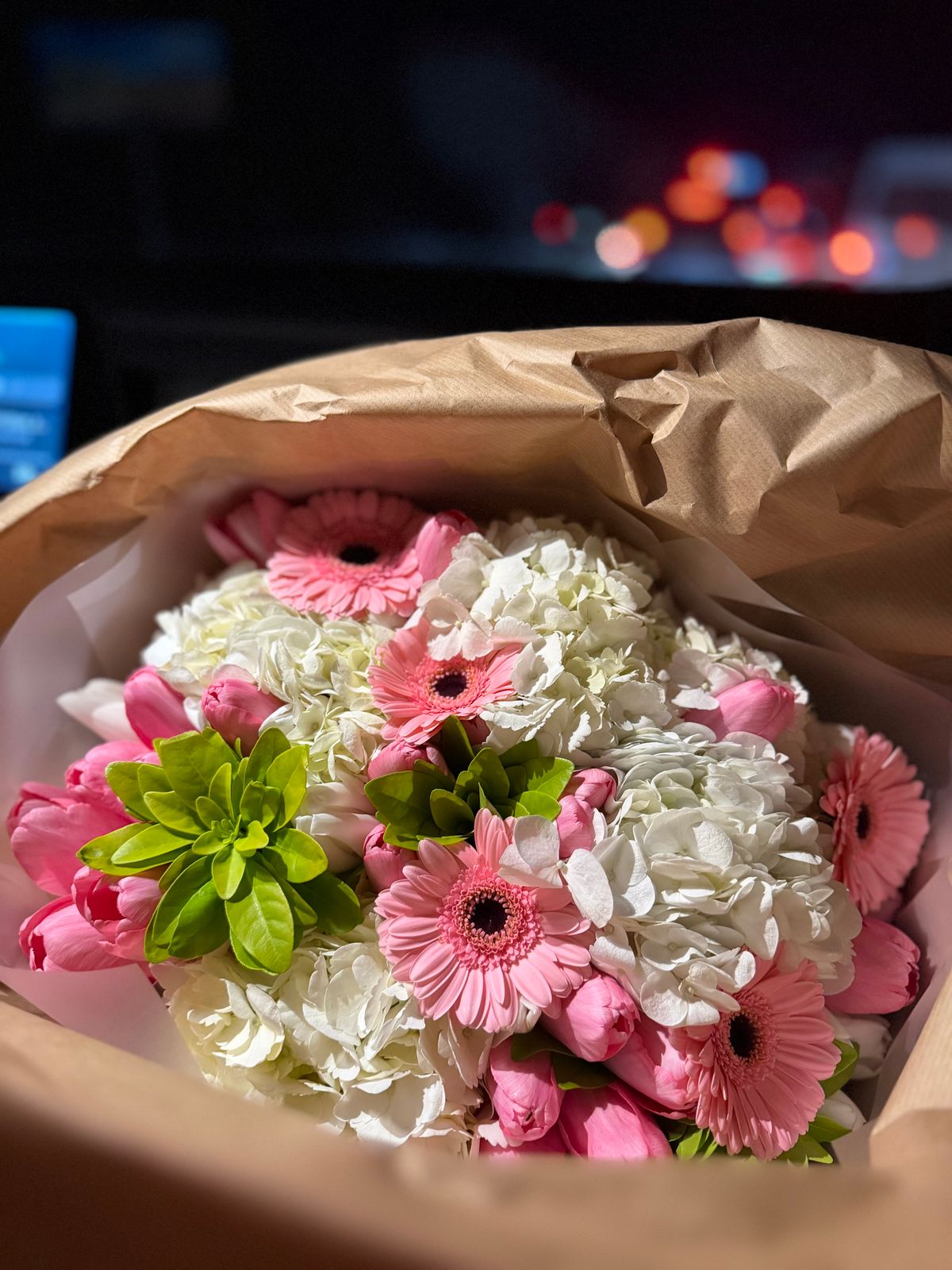 Bouquet of pink gerbera daisies and white hydrangeas, an any-occasion arrangement