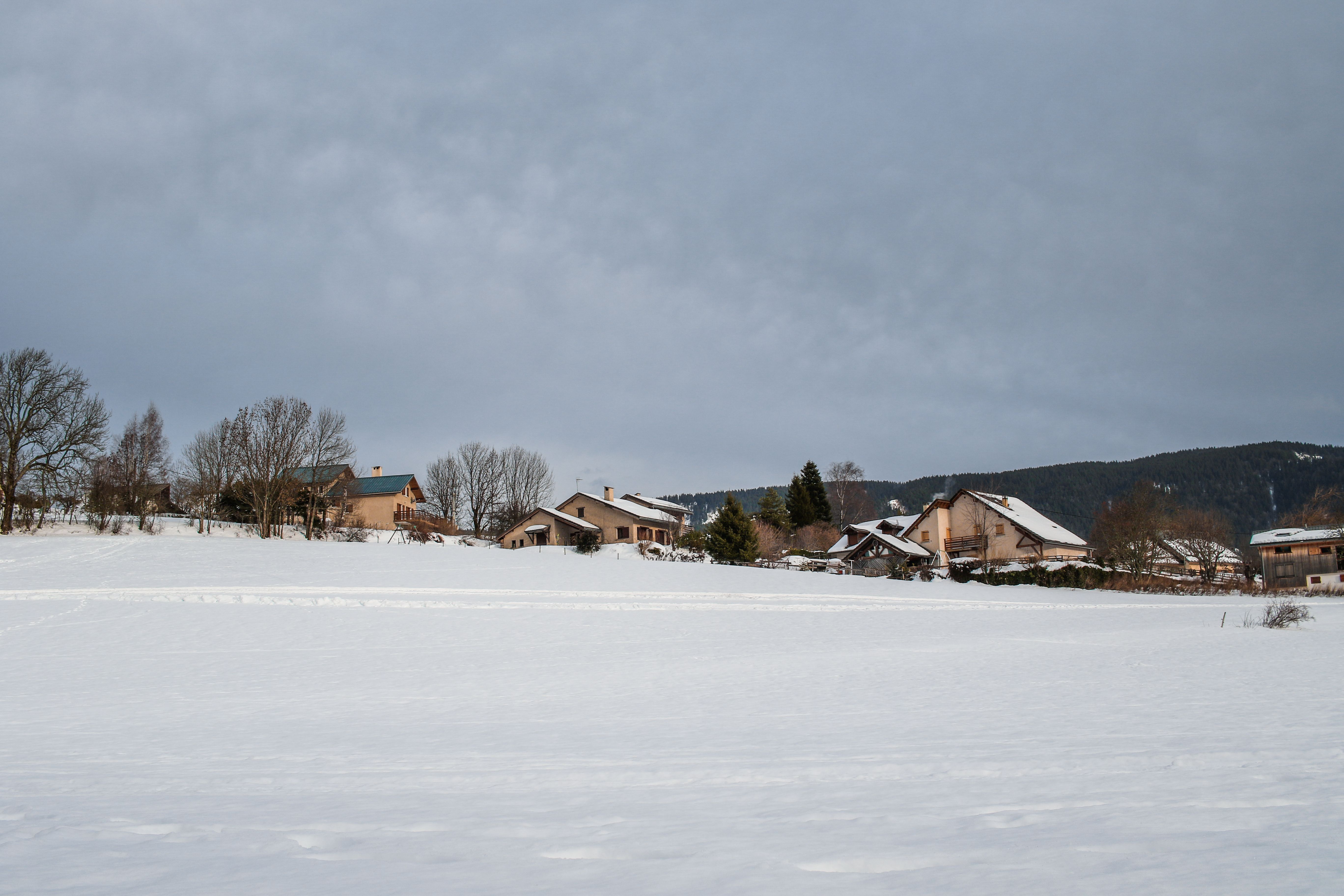 Snow-covered French Alps in winter, showing typical snowfall from November to April