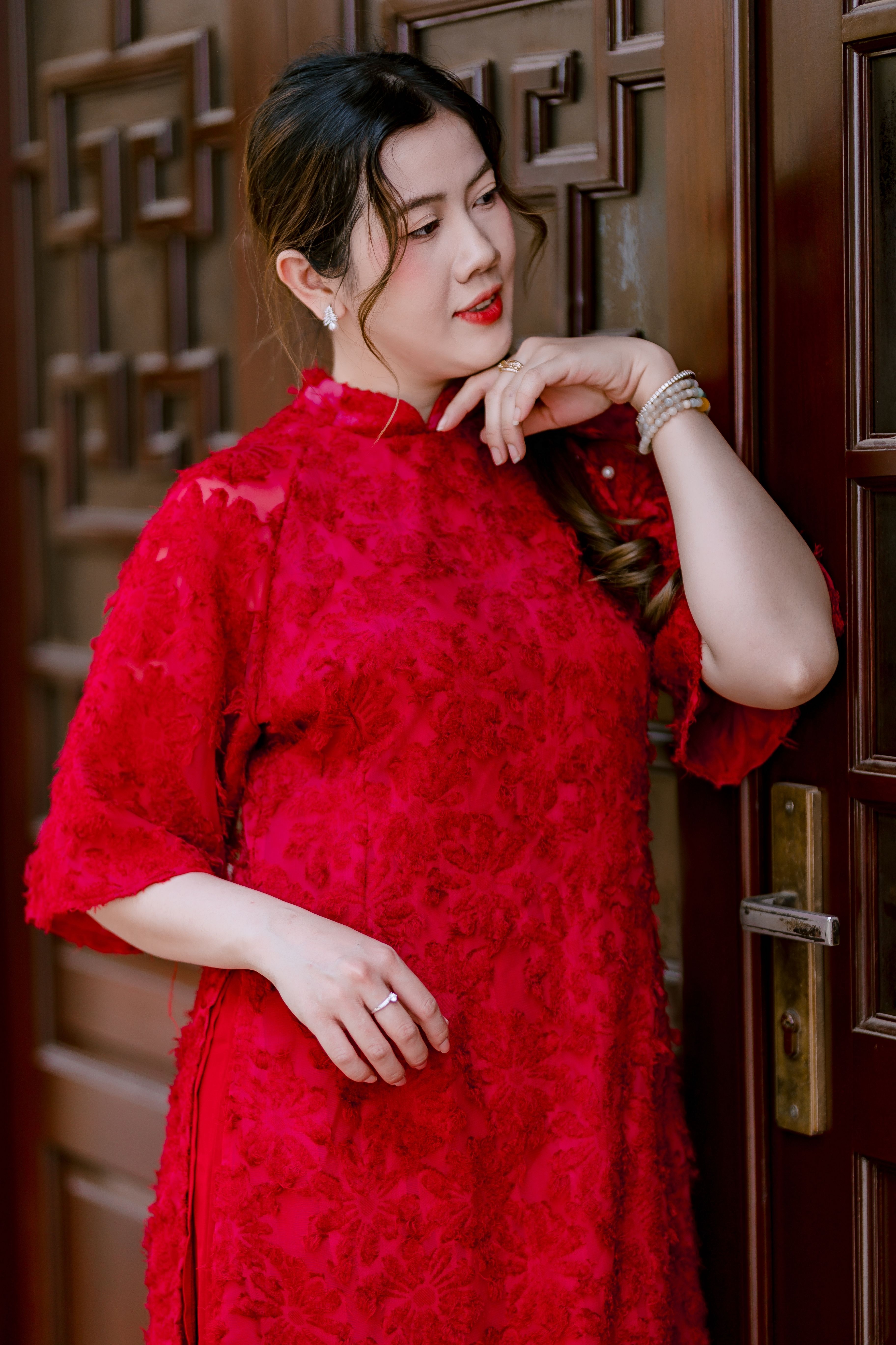 Elegant Woman in a Red Traditional Dress · Free Stock Photo