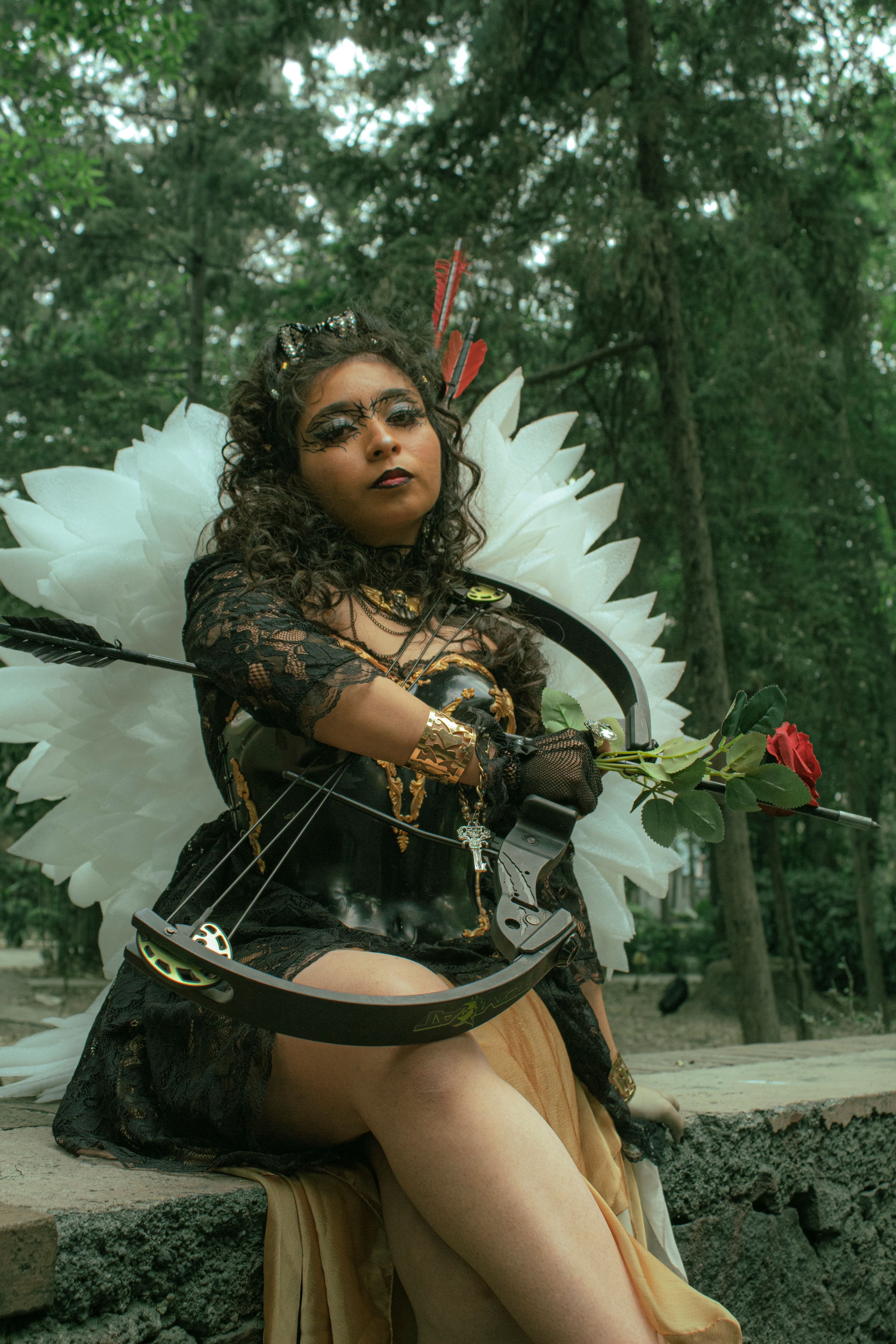 Enchanting Angelic Cosplay in Forest Setting · Free Stock Photo