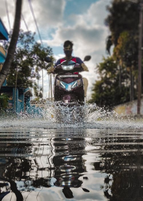 Free stock photo of 35mm photography, above water, bicycle rider Stock Photo