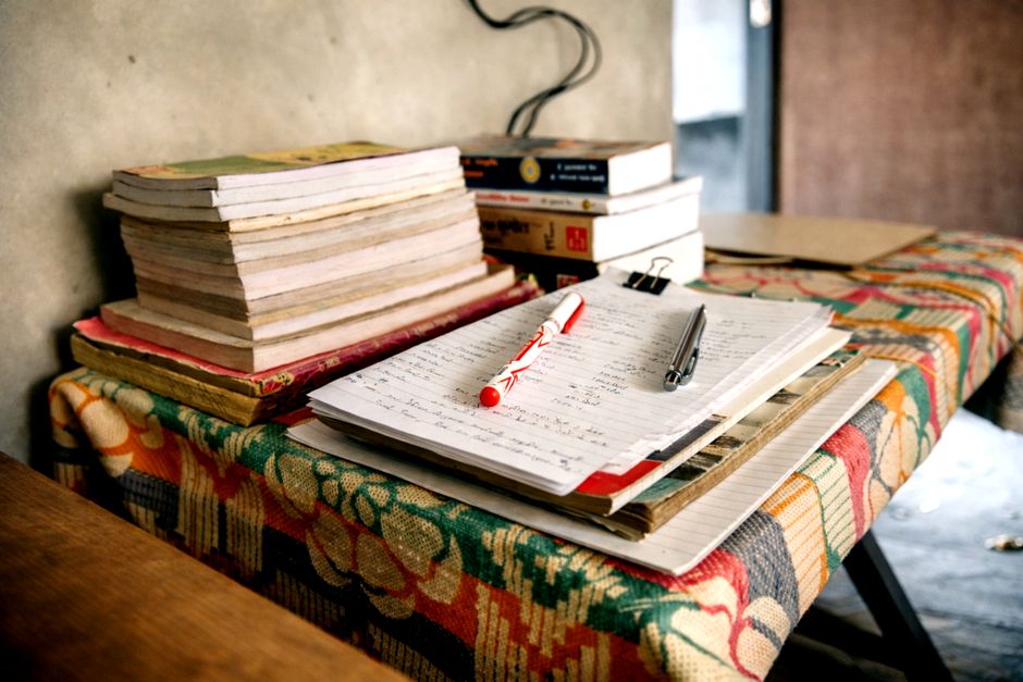 notebook and pen on desk cozy home lifestyle photo 2