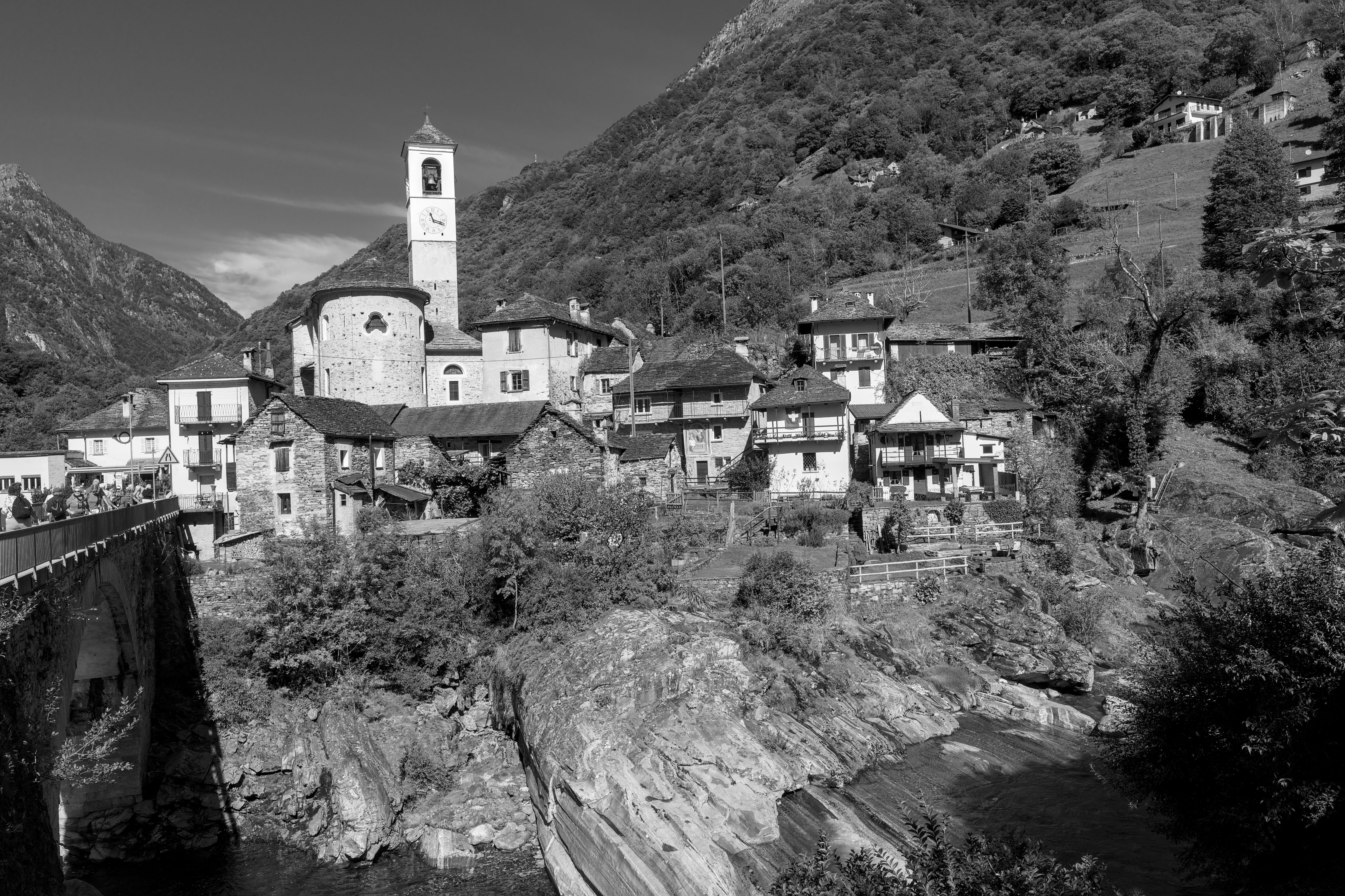 Scenic Village with Historic Stone Church in Switzerland · Free Stock Photo