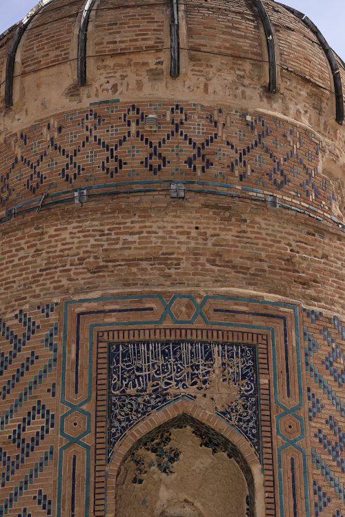 Ancient Brick Tower with Decorative Tiles · Free Stock Photo