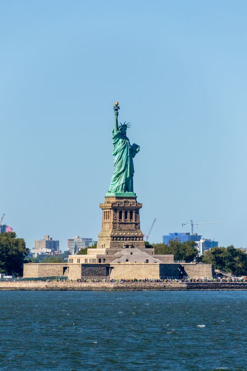 Free The iconic Statue of Liberty stands proudly in New York, representing freedom and democracy. Stock Photo