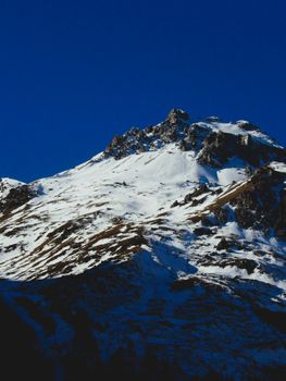 Stunning winter view of a snow-capped mountain in San Valentino Alla Muta, Italy.