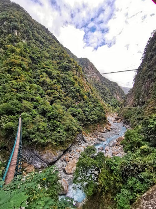Free stock photo of chain bridge, mountain ranges, waterfall