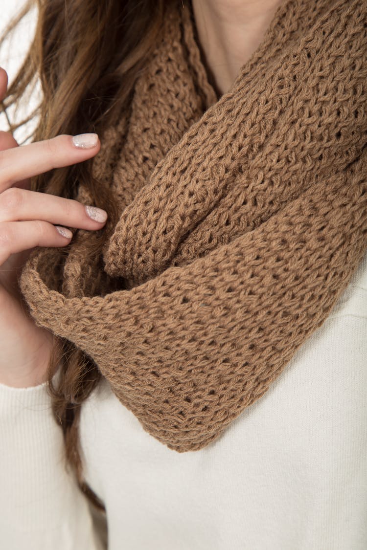 Woman In Brown Knit Scarf