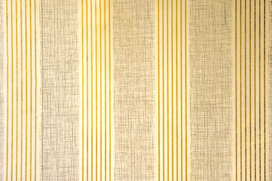 Vintage wallpaper with vertical stripes and textured patterns in beige and gold tones.