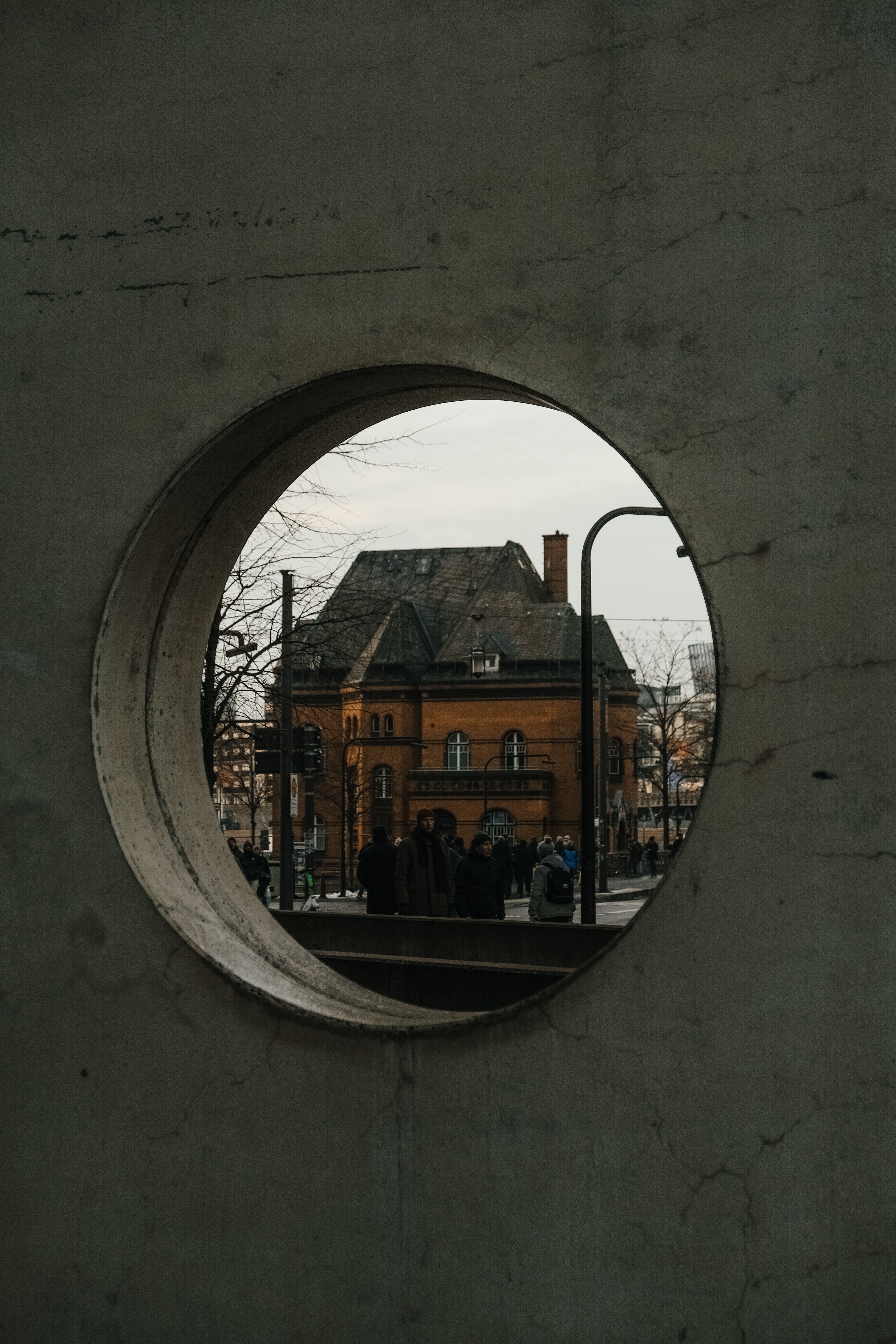 Architectural View Through Round Opening in Hamburg · Free Stock Photo