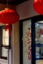 Elegant Asian Lanterns Adorning Traditional Shopfront