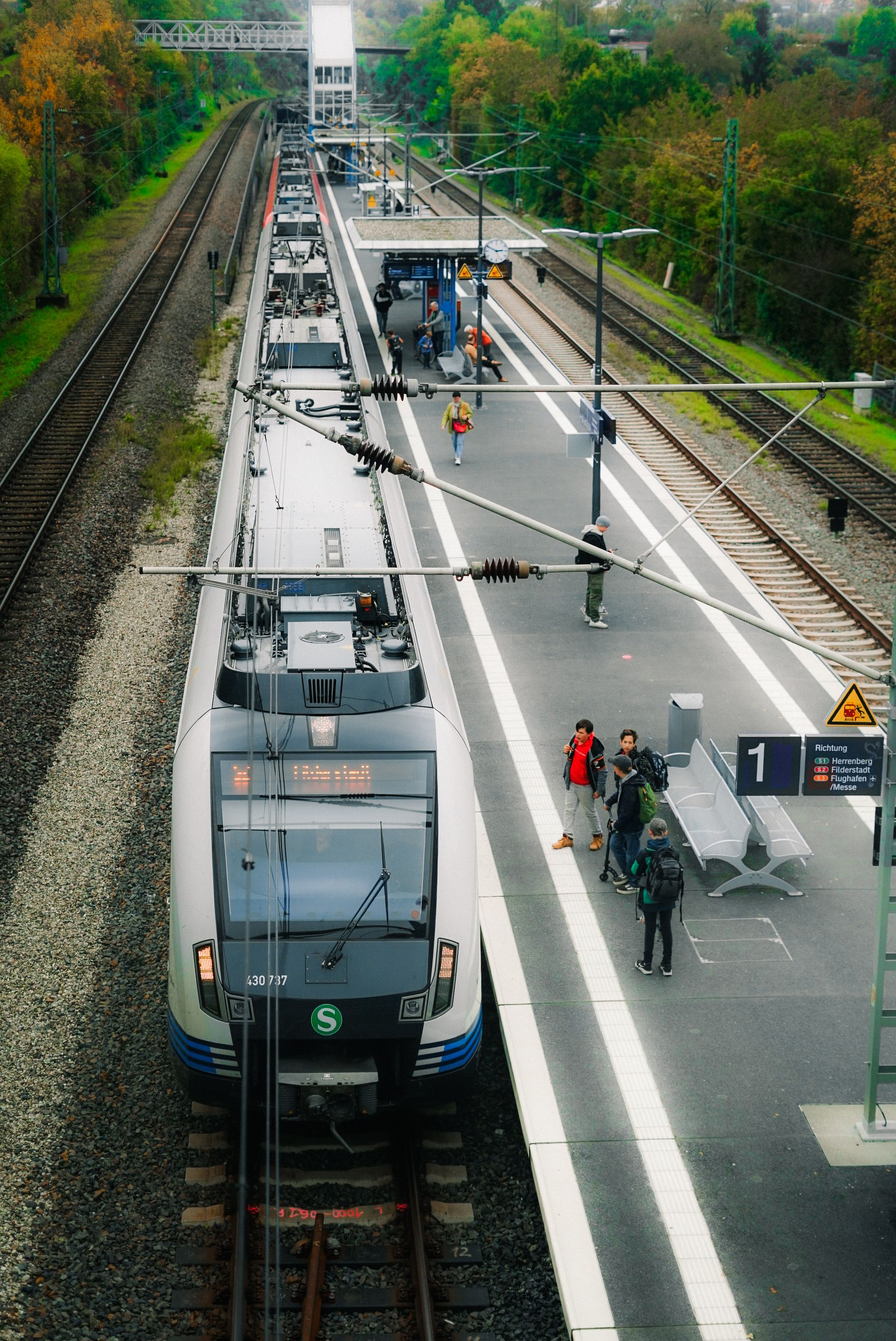 Aerial View of Train Arriving at Stuttgart Station · Free Stock Photo