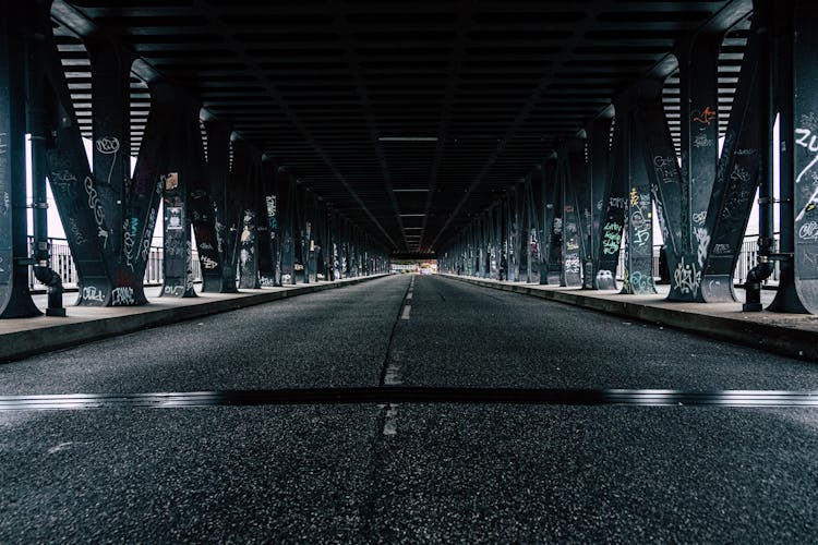 Black Asphalt Road Under Bridge