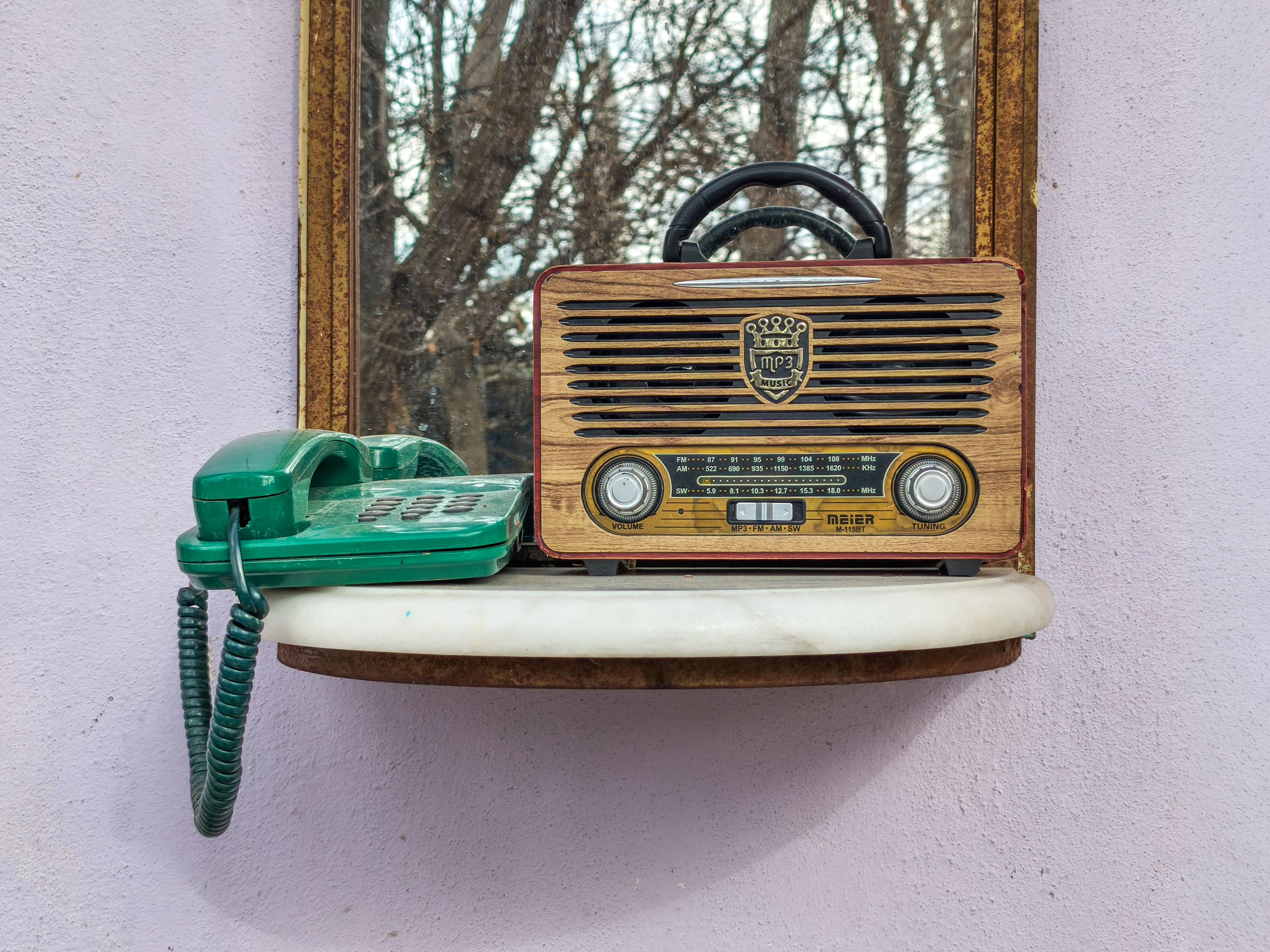 A split-screen showing a vintage radio on one side and a modern phone with the TikTok logo on the other