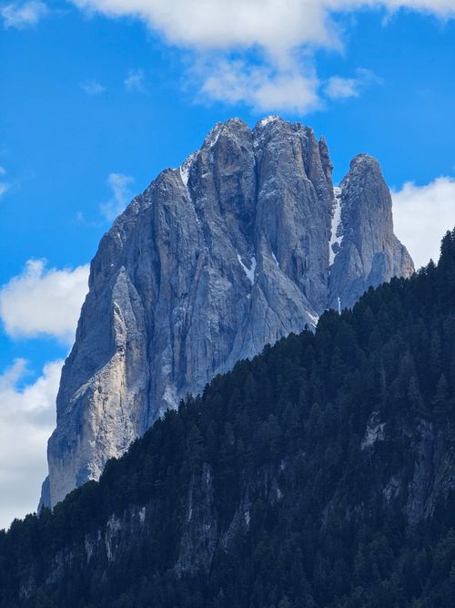 Free Stunning view of a prominent mountain peak in the Dolomites against a clear blue sky. Stock Photo