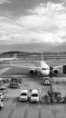 Black and White Airplane at Airport Runway