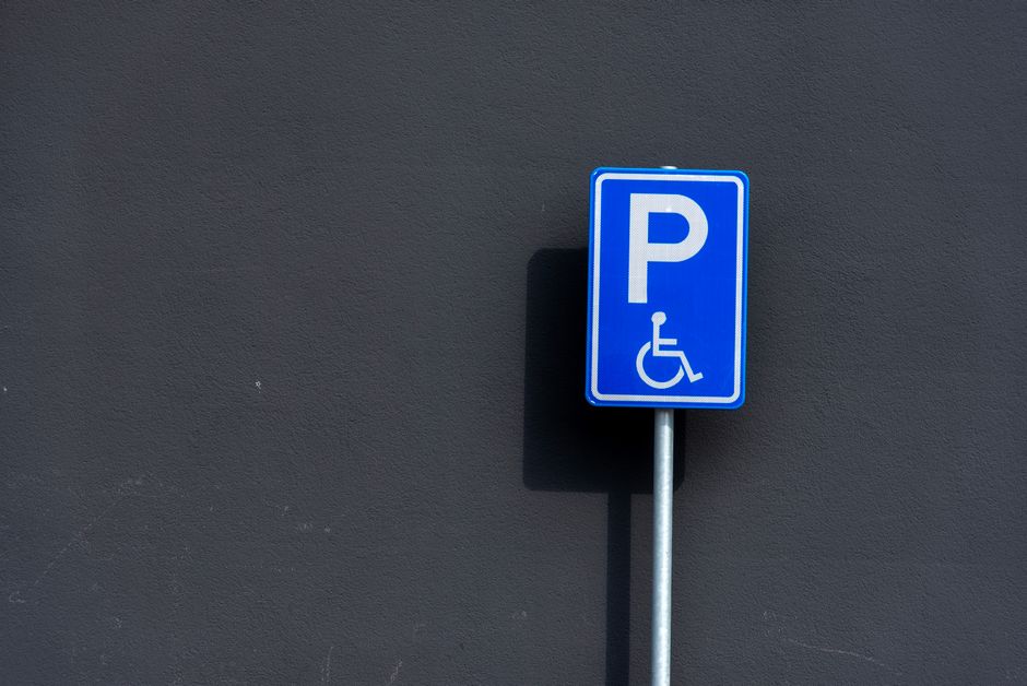 Standard post-mounted ADA handicap parking sign with International Symbol of Accessibility Standard post-mounted ADA handicap parking sign with International Symbol of Accessibility
